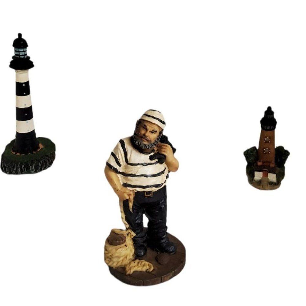 vintage mayrich company set of 3 resin 2 lighthouse's and 1 sailor various sizes
